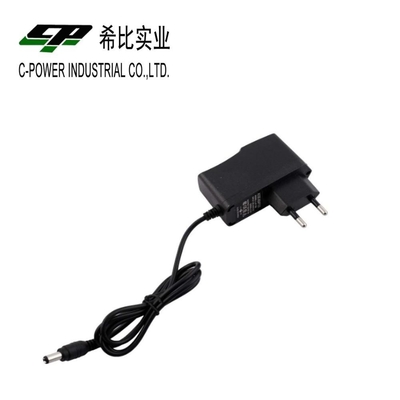 Tipo de salida de corriente continua montada en la pared de la UA 12V 1A 5V 2A 6V 2A 9V 2A Adaptador de corriente 12VDC 1A Adaptador de corriente alterna