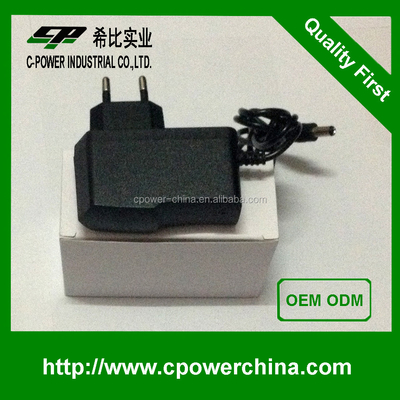 Tipo de salida de corriente continua montada en la pared de la UA 12V 1A 5V 2A 6V 2A 9V 2A Adaptador de corriente 12VDC 1A Adaptador de corriente alterna