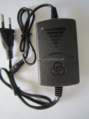 US AC 100-240V a DC 12V 2A Adaptador de fuente de alimentación para productos electrónicos de luz de banda LED