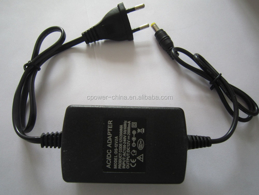 US AC 100-240V a DC 12V 2A Adaptador de fuente de alimentación para productos electrónicos de luz de banda LED