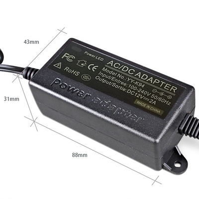 C-Power negro AC100-240V DC 12V 2A Adaptador de alimentación de enchufe de pared 12V para la UE AU Reino Unido EE.UU.